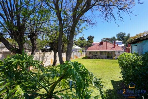 31 Arundel Street Bayswater view of rear big block through the trees