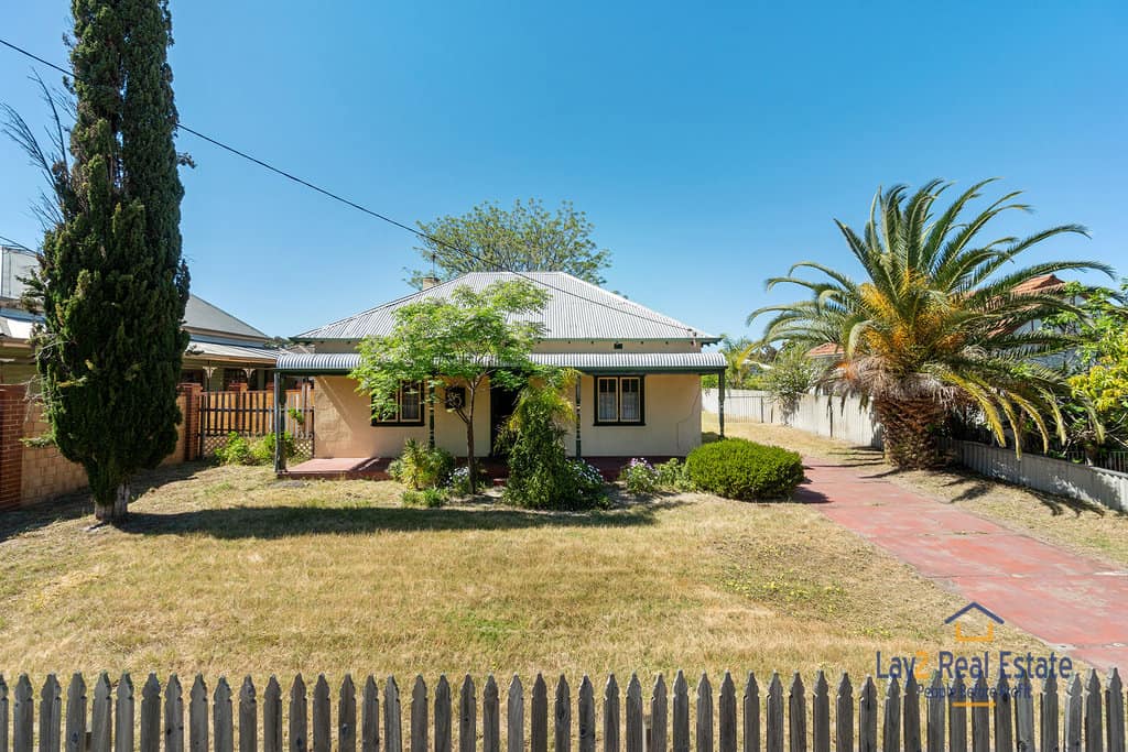 Development potential land with a free house image.