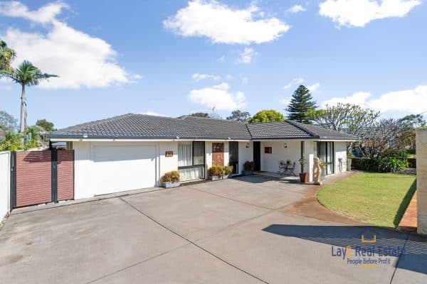 20 Flora Avenue Bayswater WA 6053 front of property and drive way image. Property for sale by Lay2 Real Estate.