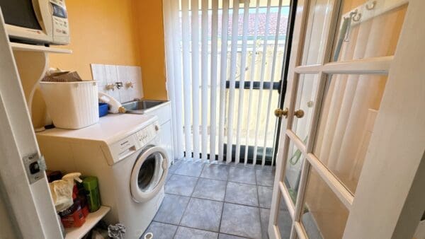 20 McWhae Gardens Bayswater. Laundry. Contact Mick Lay