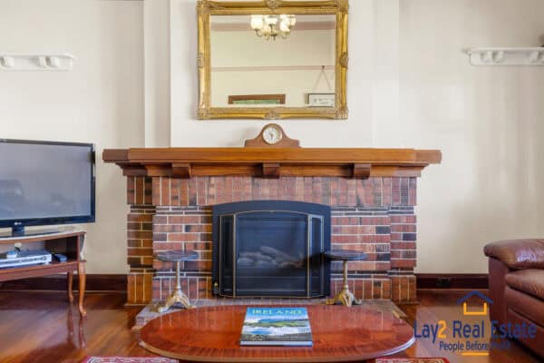 For Sale. 22 Beechboro Road South, Bayswater. Lay 2 Real Estate. Mick Lay. Formal Living Fire Place.