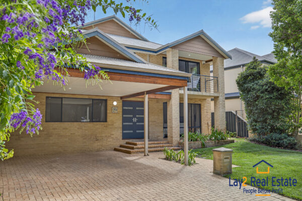 For Sale by Lay2 Real Estate 19 Woolnough St, Daglish Front facade with double carport image.